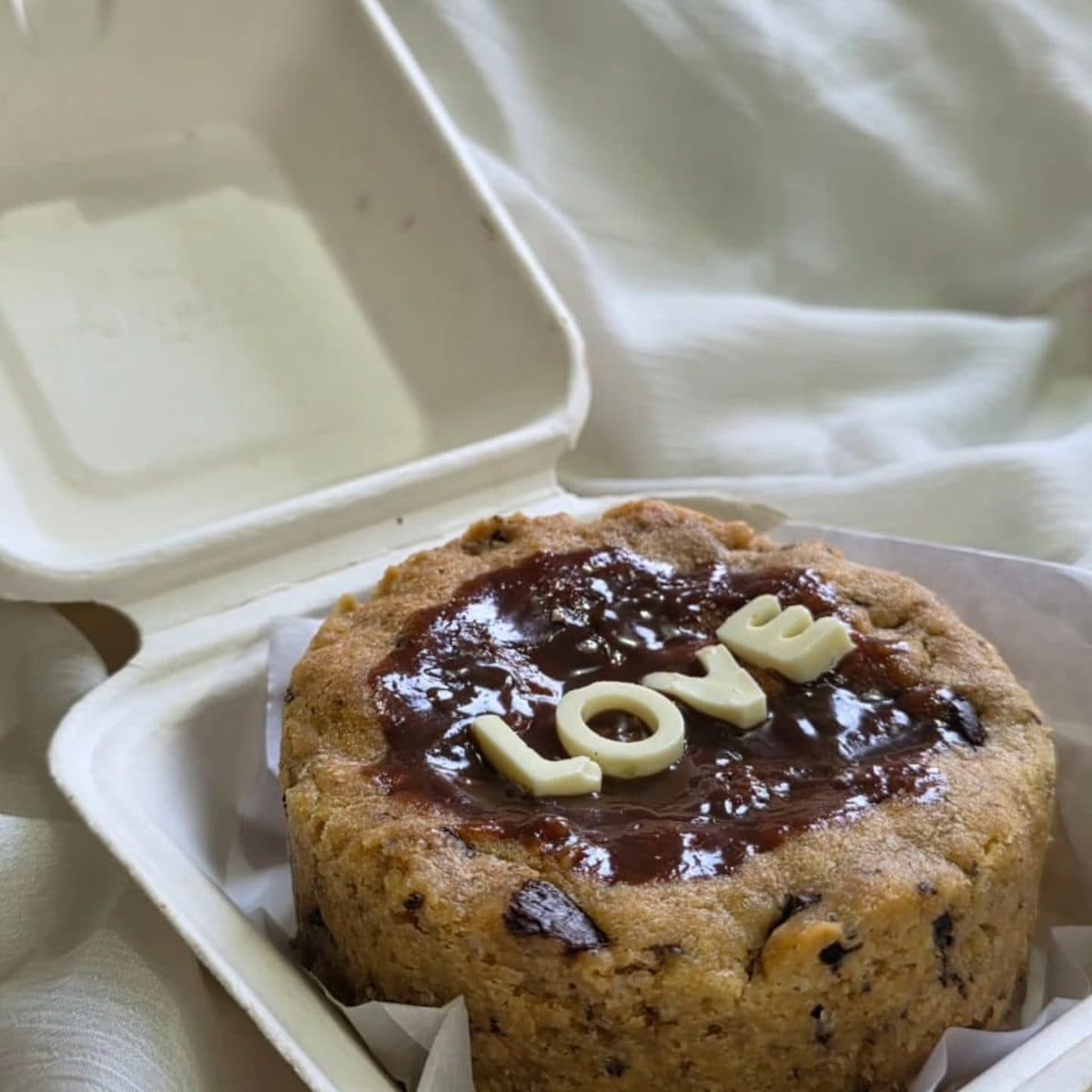 Bento cookie cake with LOVE written in white chocolate