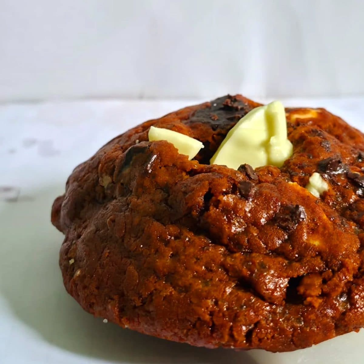 Red velvet cookie topped with white chocolate
